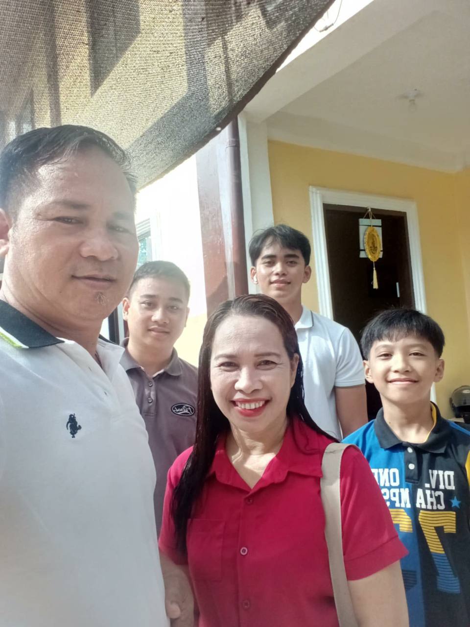 Mr. and Mrs. Camarote with their family at home in Palawan