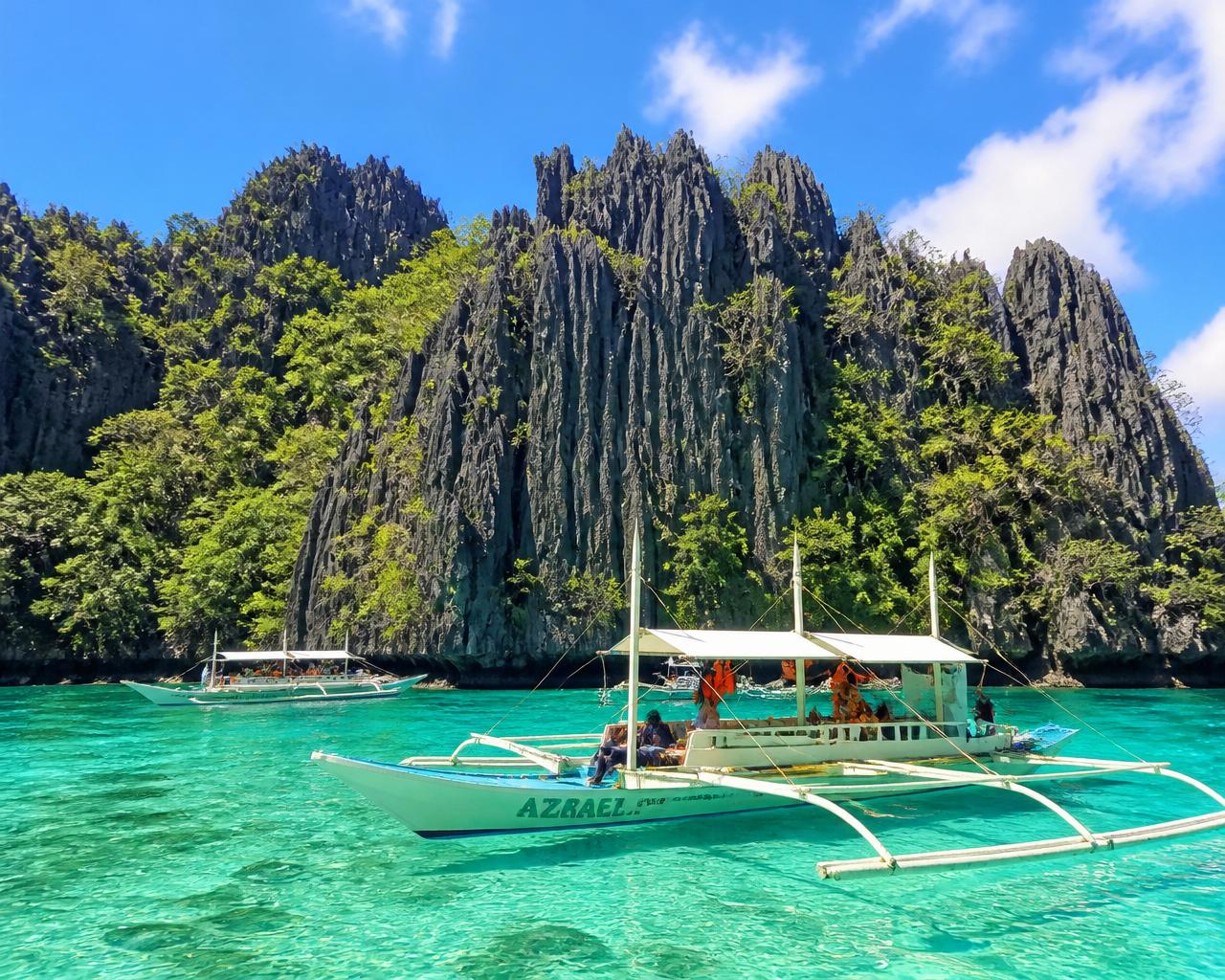 Boats on clear blue water